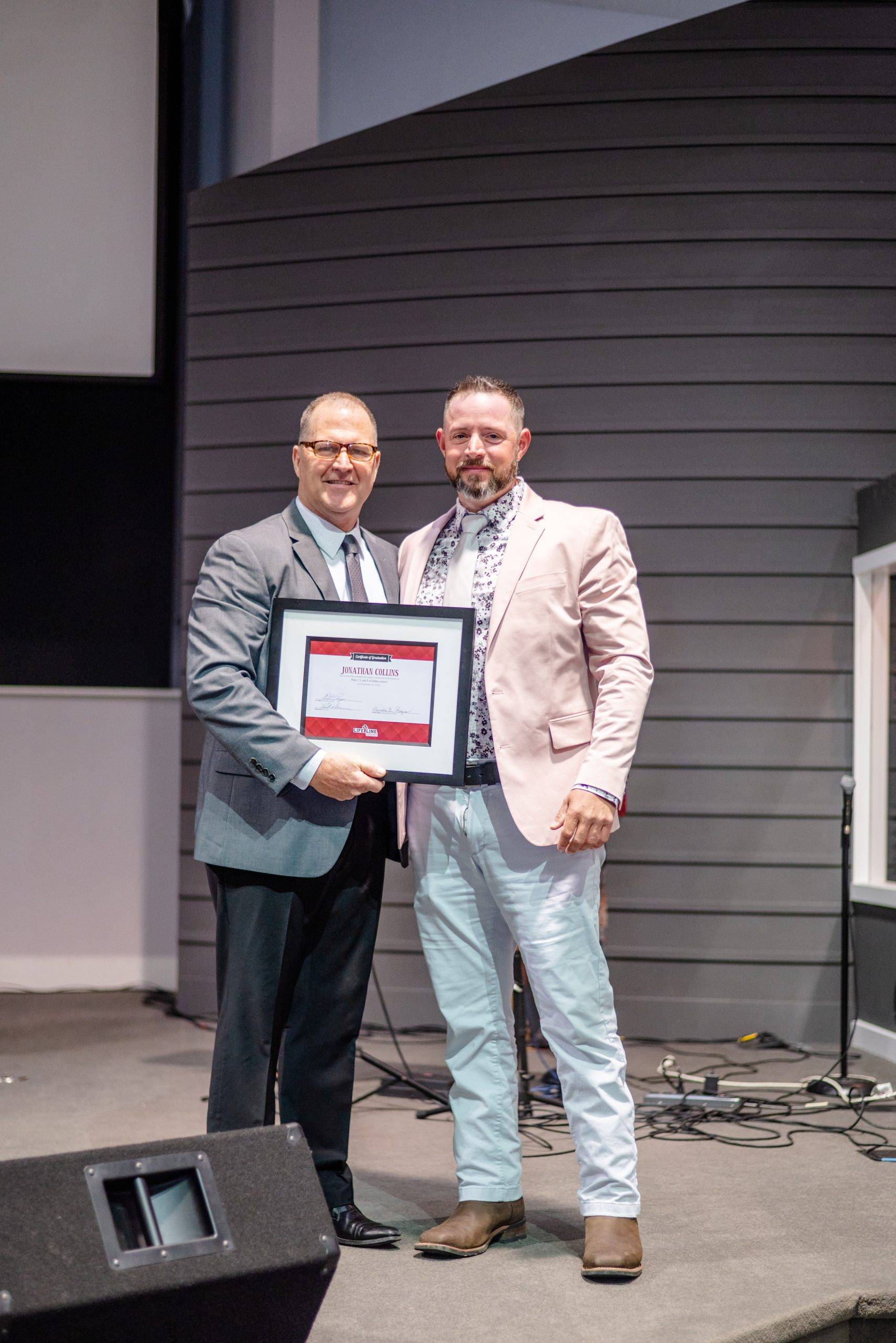 Graduate Rob Finley Receiving His Certificate